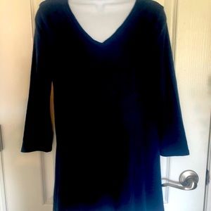 Chicos round neck 3/4 sleeve cotton knit tunic with hi lo hem.